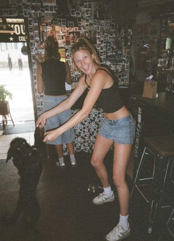 A regular dancing with a dog inside, shot on film